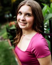 headshot of Clara Thompson